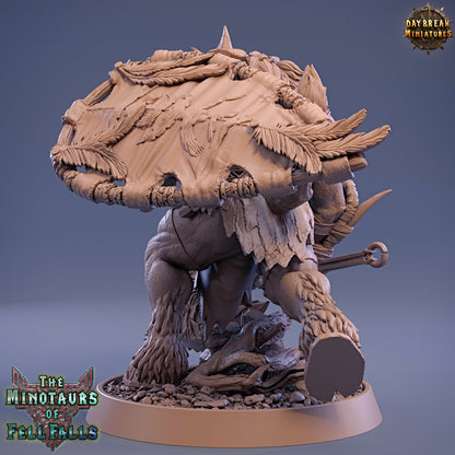 Minotaur figurine with detailed armor and fur on a blue gradient background, featuring 'Daybreak Miniatures' logo.