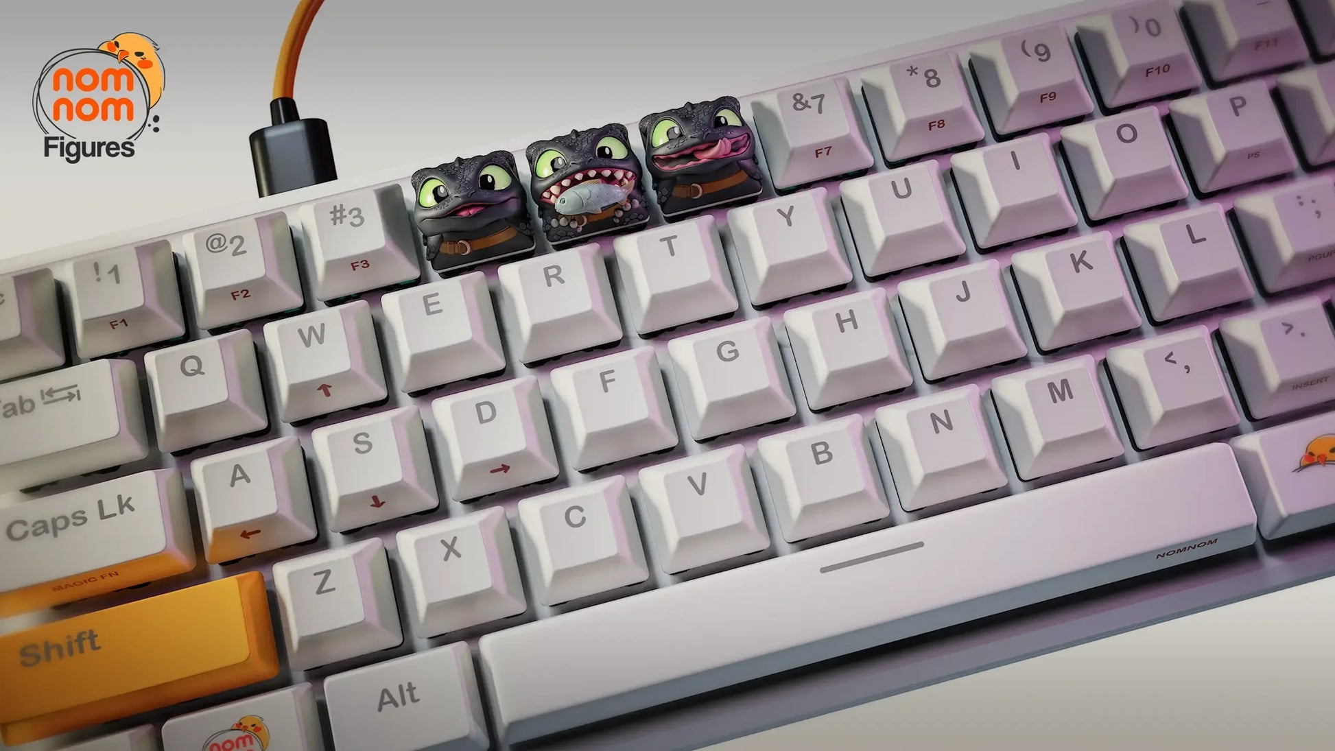 Full keyboard view with Toothless artisan keycaps installed