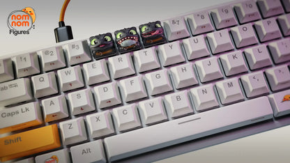 Full keyboard view with Toothless artisan keycaps installed