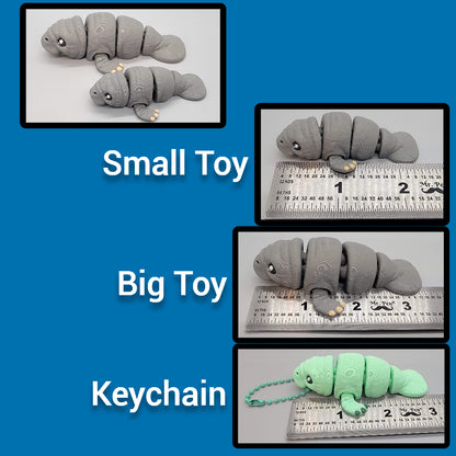 Comparison of small, big, and keychain versions of manatee toys with a green keychain on a blue background.