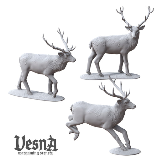 Three majestic red deer stag resin miniatures sculpted by Vesna Sculpts.