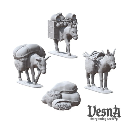 Resin packed donkey miniatures with sacks and crates for caravan or market TTRPG and wargaming terrain