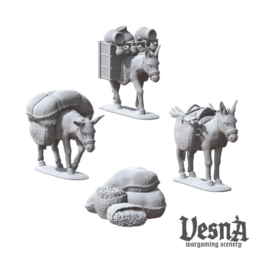 Resin packed donkey miniatures with sacks and crates for caravan or market TTRPG and wargaming terrain