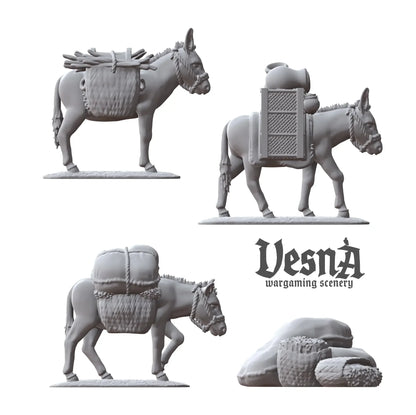 Three resin packed donkey miniatures plus separate cargo piles, perfect for fantasy or historical tabletop games