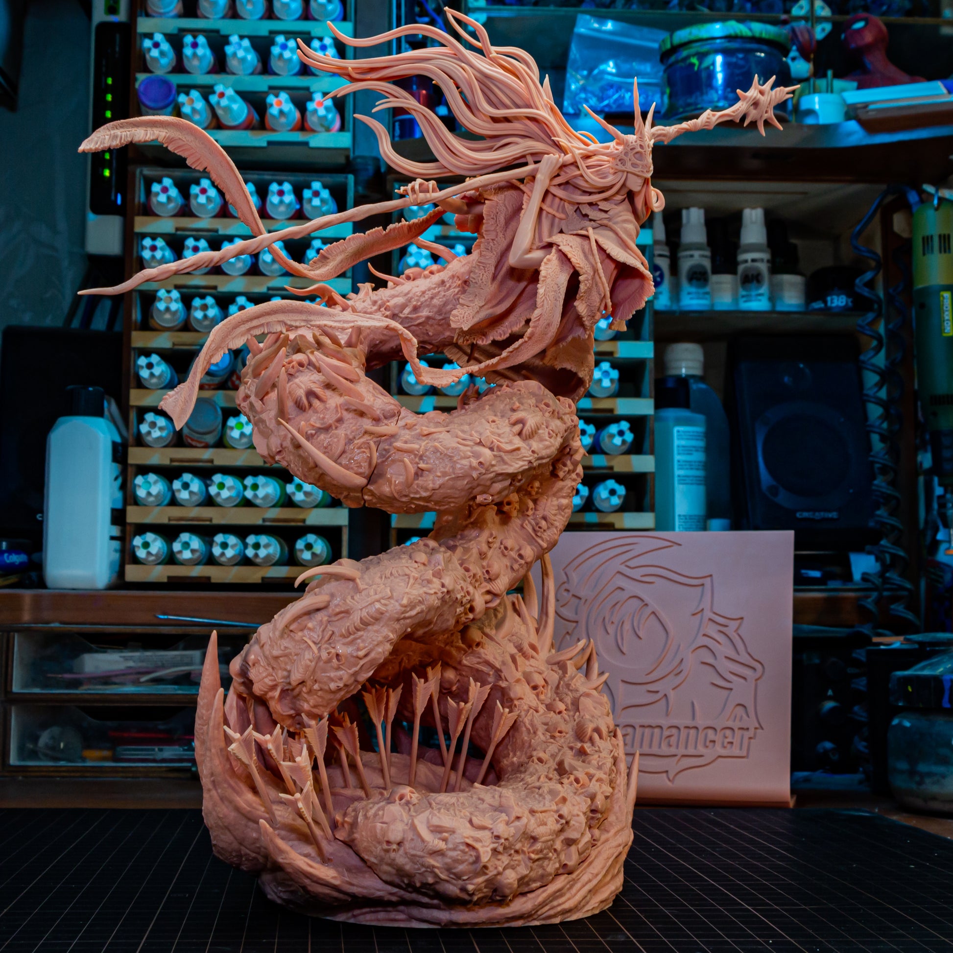 Fully assembled 1:8 scale resin printed figure of Aldrich by Bulkamancer on a workbench, showcasing intricate details and overall size.