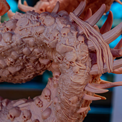 Extreme close-up of the 3D printed resin textured tail section covered in finely detailed micro skulls and bones.