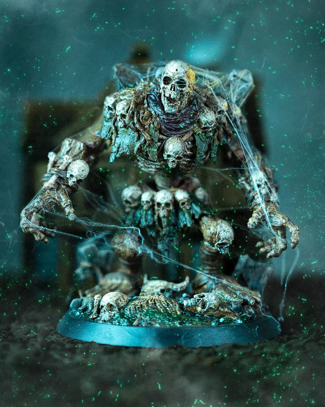 Fully painted Tombstone Golem front view with spiderwebs, skull-covered torso, and tombstone shoulder detail.