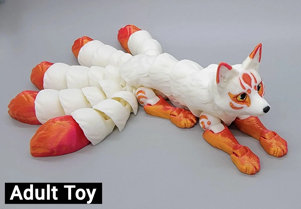 Adult size orange and white 3D printed articulated nine-tailed kitsune fox toy