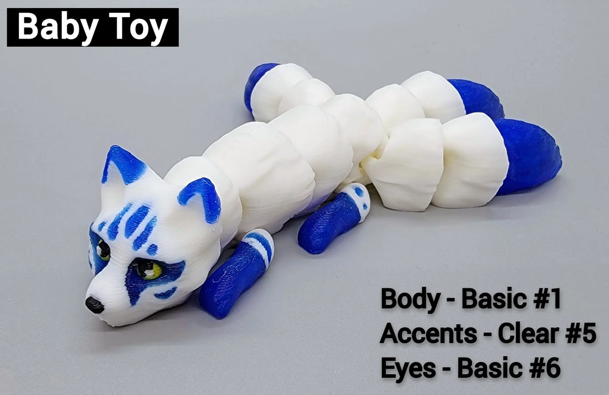 Blue and white baby sized 3D printed articulated kitsune toy