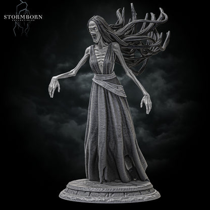 Full body front view of the Banshee standing on a round stone base by Stormborn Collectibles.