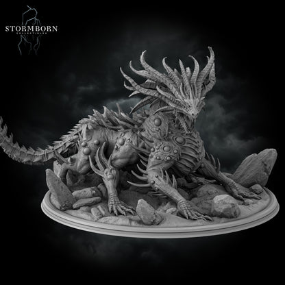 Low angle shot looking up at the Gargantuan Basilisk King resin figure by Stormborn Collectibles.