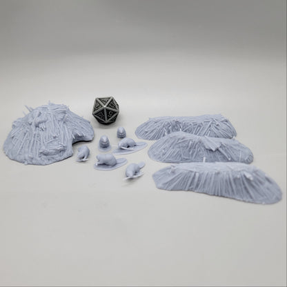 Wide overhead layout view of the unpainted gray resin Beaver Pack scatter terrain kit by Vesna Sculpts.