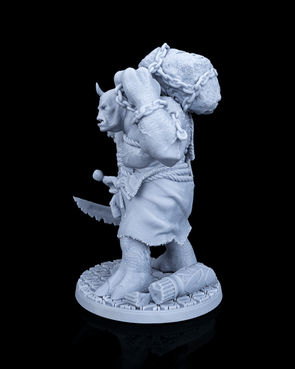 Left profile view of the Brugtilda the Bloated miniature emphasizing the massive chained boulder carried on her back.