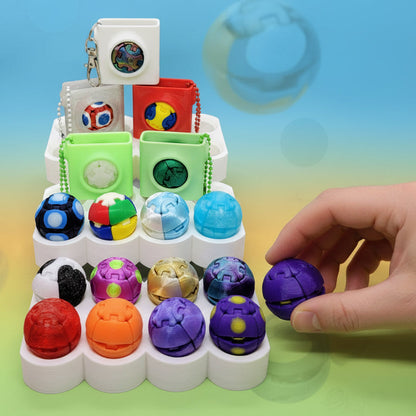 collection of custom zorble click fidget balls in multiple colors with optional carrying cases and hand pressing purple ball showing click action