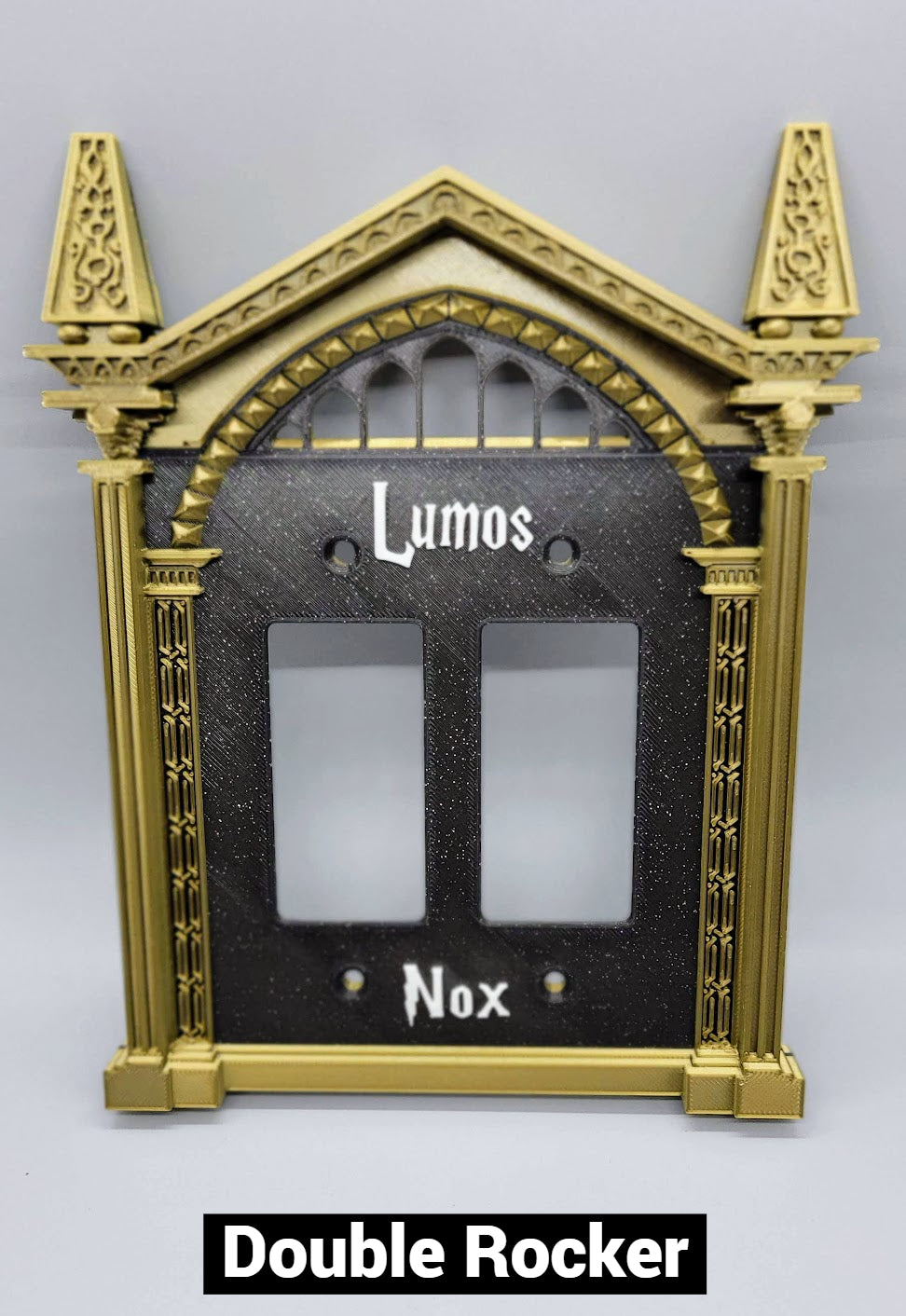 Double rocker wizard light switch cover with custom magical wall plate design. Shown in Bronze Frame, Sparkle Black Plate, and White Lettering