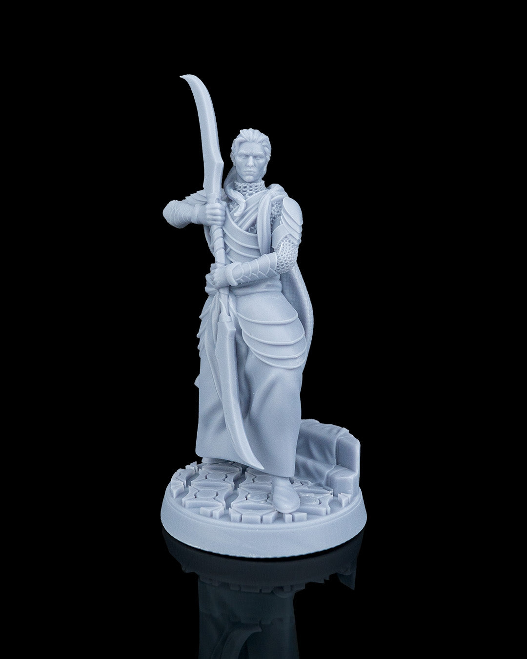 Enforcer Elven Warrior resin miniature by Artificers Mini holding a double-bladed glaive staff.