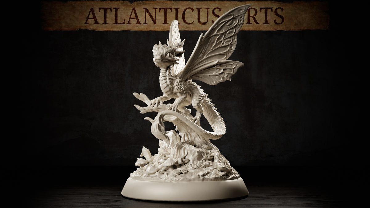 Full-body Youth Fairy Dragon miniature with large patterned wings, clawed feet, long scaled tail, twisted branch, and detailed woodland base.