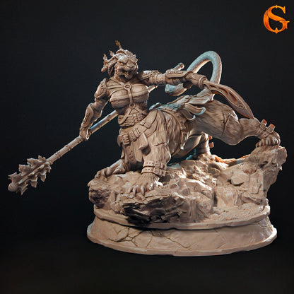 Front render view of the unpainted resin Fariba Khaz Wemic lion-centaur miniature standing on a large rocky display base, wielding a mace and a curved sword.