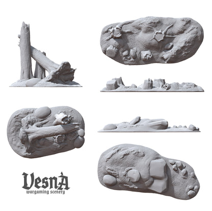 Top-down and side profile view layouts of the three individual forest debris resin models, detailing rock textures and broken wood grains.