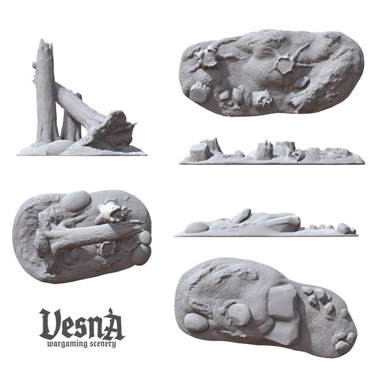 Top-down and side profile view layouts of the three individual forest debris resin models, detailing rock textures and broken wood grains.