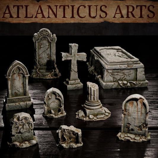 Close-up of 9 different painted grey-and-mossy stone tombstones, a sarcophagus, a cross, and a broken pillar on a dark wood surface under the Atlanticus Arts banner.