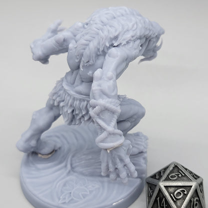 Rear angled view of unpainted Hag Cursed Troll 3 showing its leaning pose, extended arm, and scenic base.