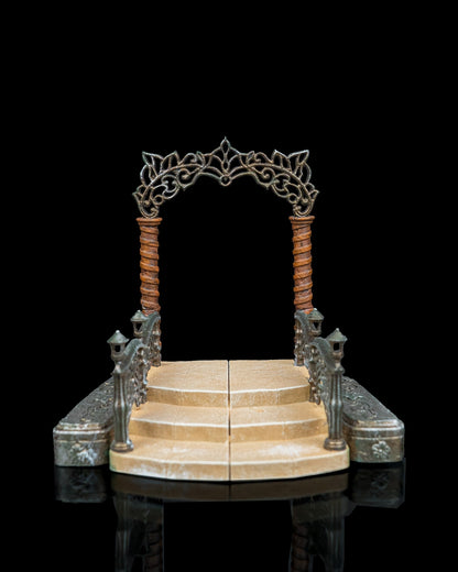 Front view of a 32mm modular elven portal miniature featuring a two-part base and ornate swirling metal arch header.