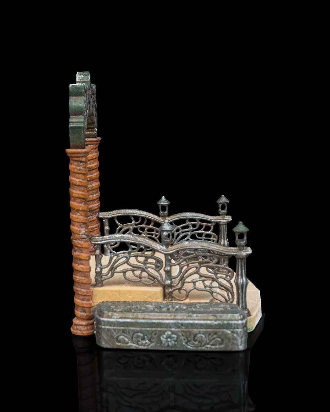 Side view of a 32mm modular elven portal miniature featuring a two-part base and ornate swirling metal arch side railings.