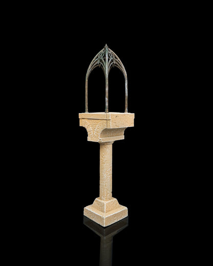 An elegant elven walkway miniature showing the supporting column, floor, and open gothic-style iron canopy roof.