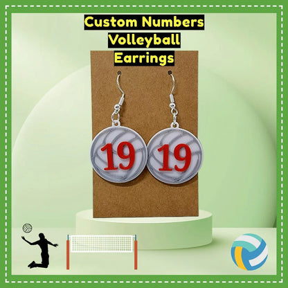 Custom Number Volleyball Earrings – 3D printed sports jewelry with red jersey number on white volleyball design, ideal for athletes and fans.