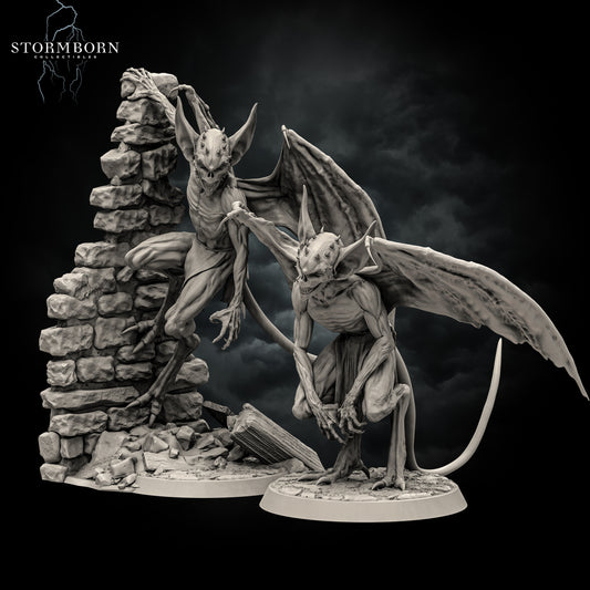 Angled render showing the depth, wing spans, and stone wall base details of the imp miniature set by Stormborn Collectibles.