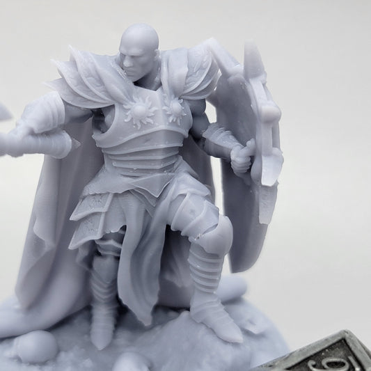 Side view of Invictus Lighthammer showing heavy armor, flowing cape, warhammer, and ornate shield.