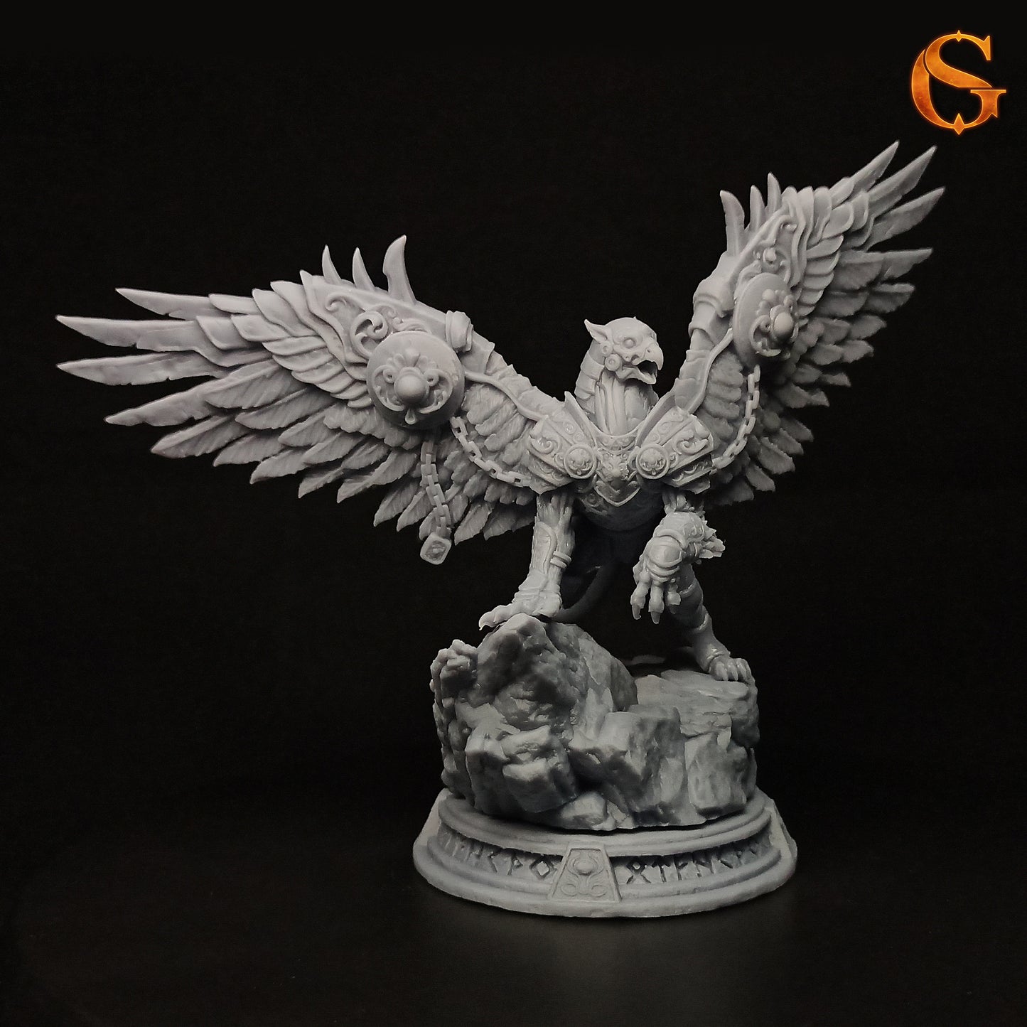 Photo of the physical grey resin 3D printed Ironwing the Guardian miniature assembled on its runic stone display base.