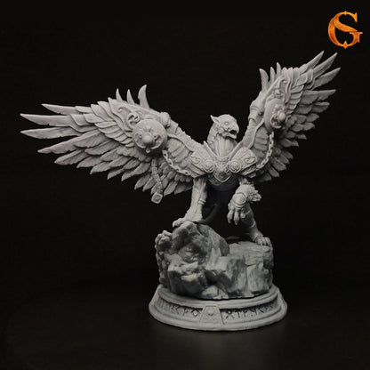 Photo of the physical grey resin 3D printed Ironwing the Guardian miniature assembled on its runic stone display base.