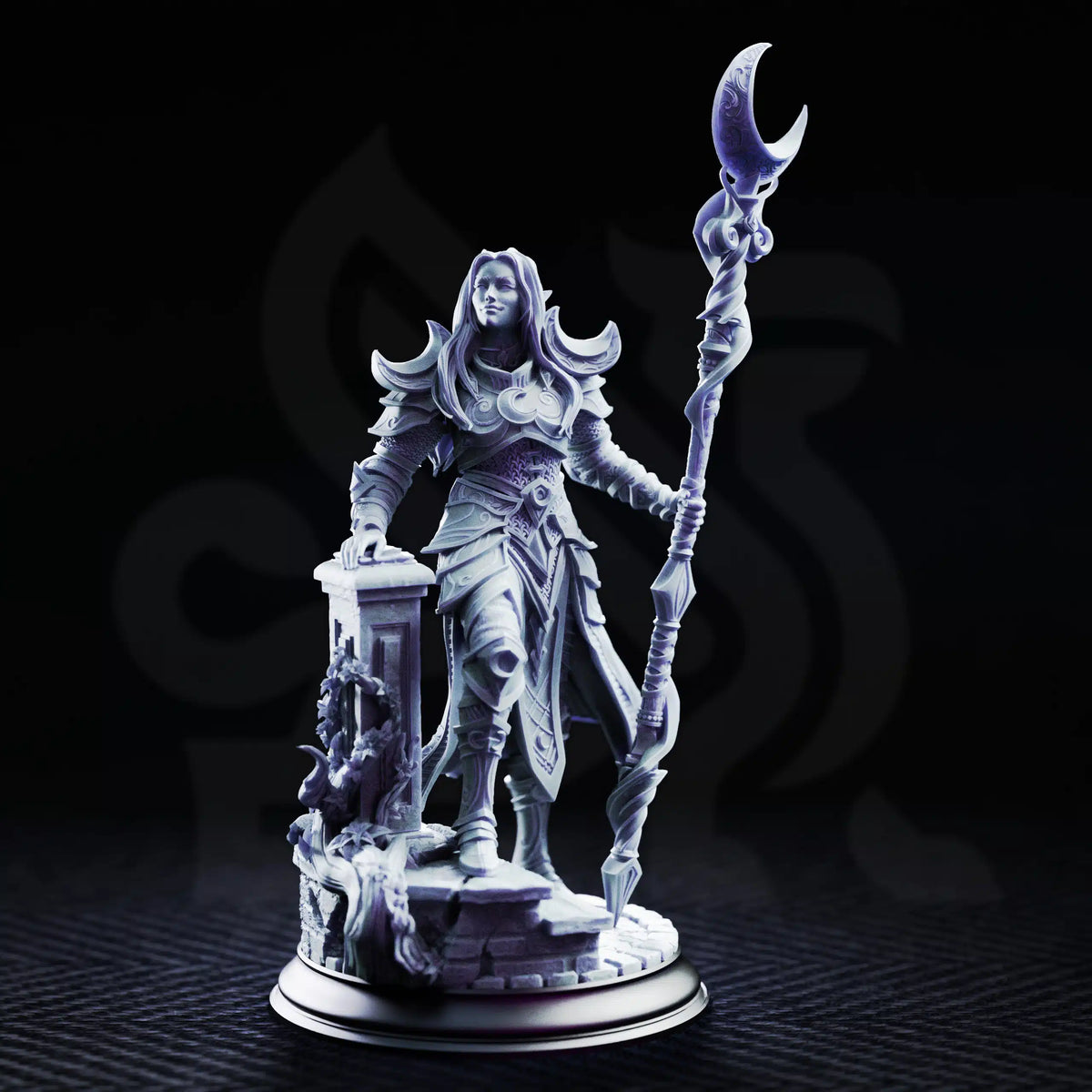 Front view of Kadna Glydrin Drow sorcerer resin miniature in layered armor holding a crescent staff beside a ruined pillar