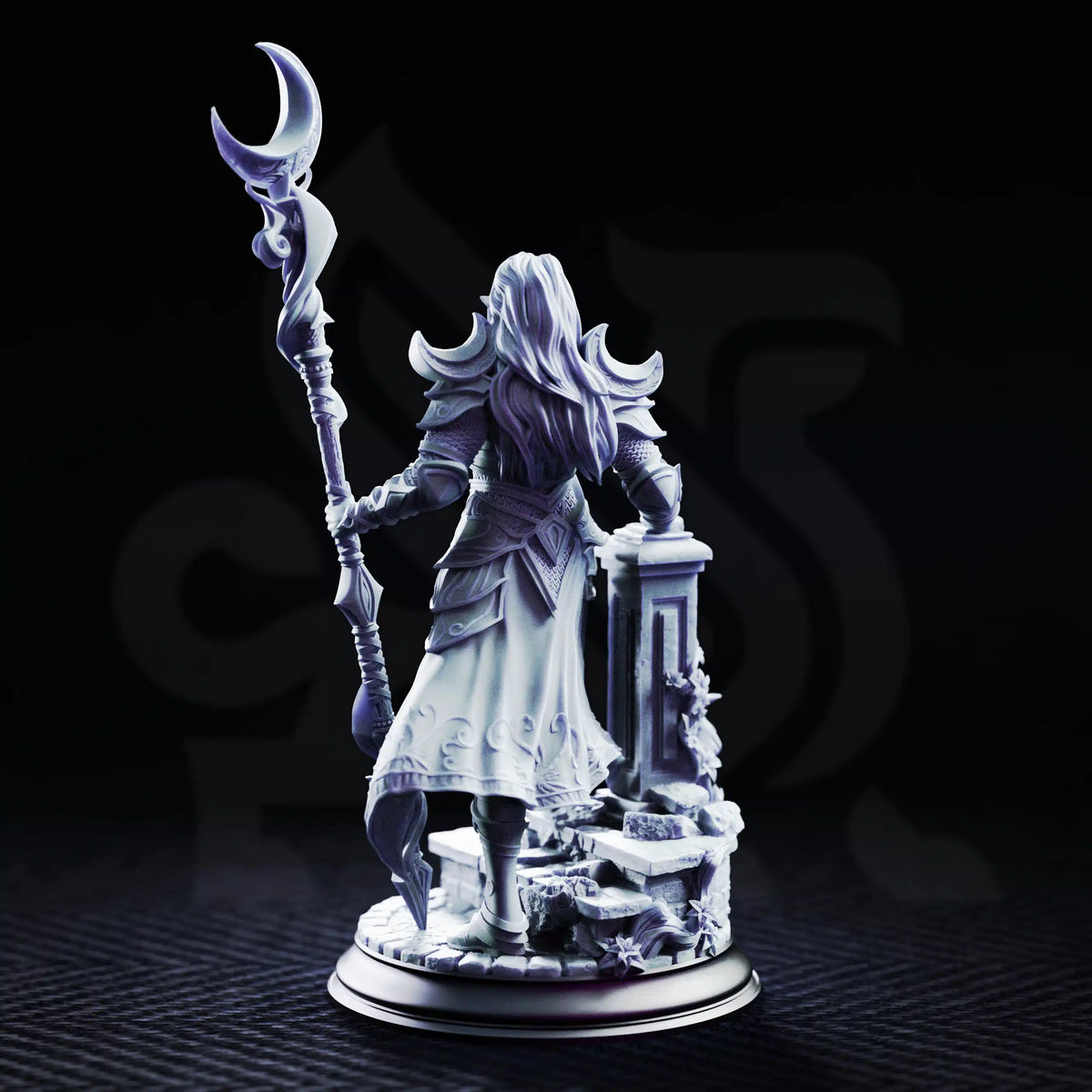 Rear view of Kadna Glydrin Drow sorcerer miniature showing long hair, crescent shoulder armor, engraved robes, staff, and ruined base