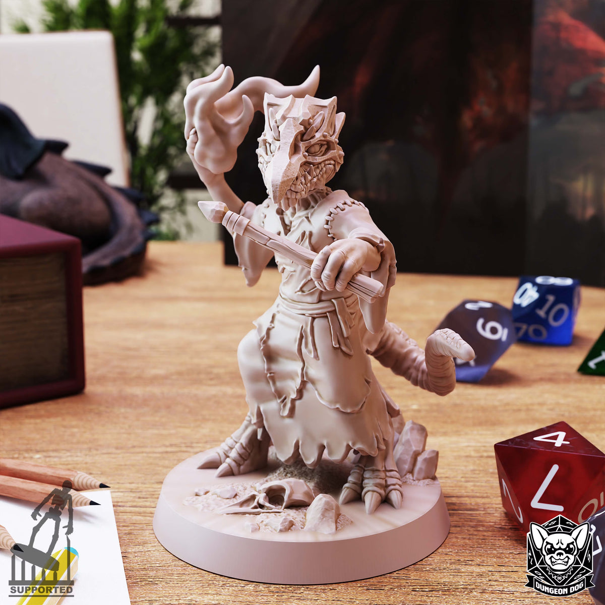 Kobold Wizard resin miniature by Dungeon Dog holding a wand and conjuring magic above a rocky base.
