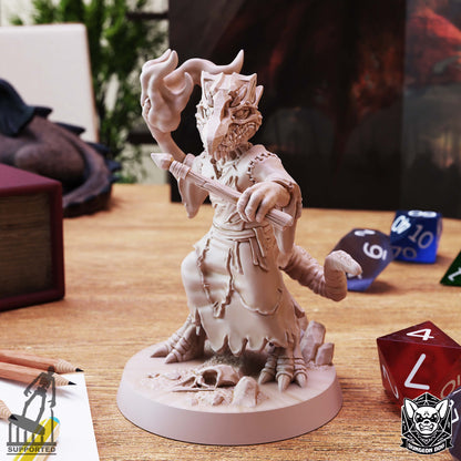 Kobold Wizard resin miniature by Dungeon Dog holding a wand and conjuring magic above a rocky base.