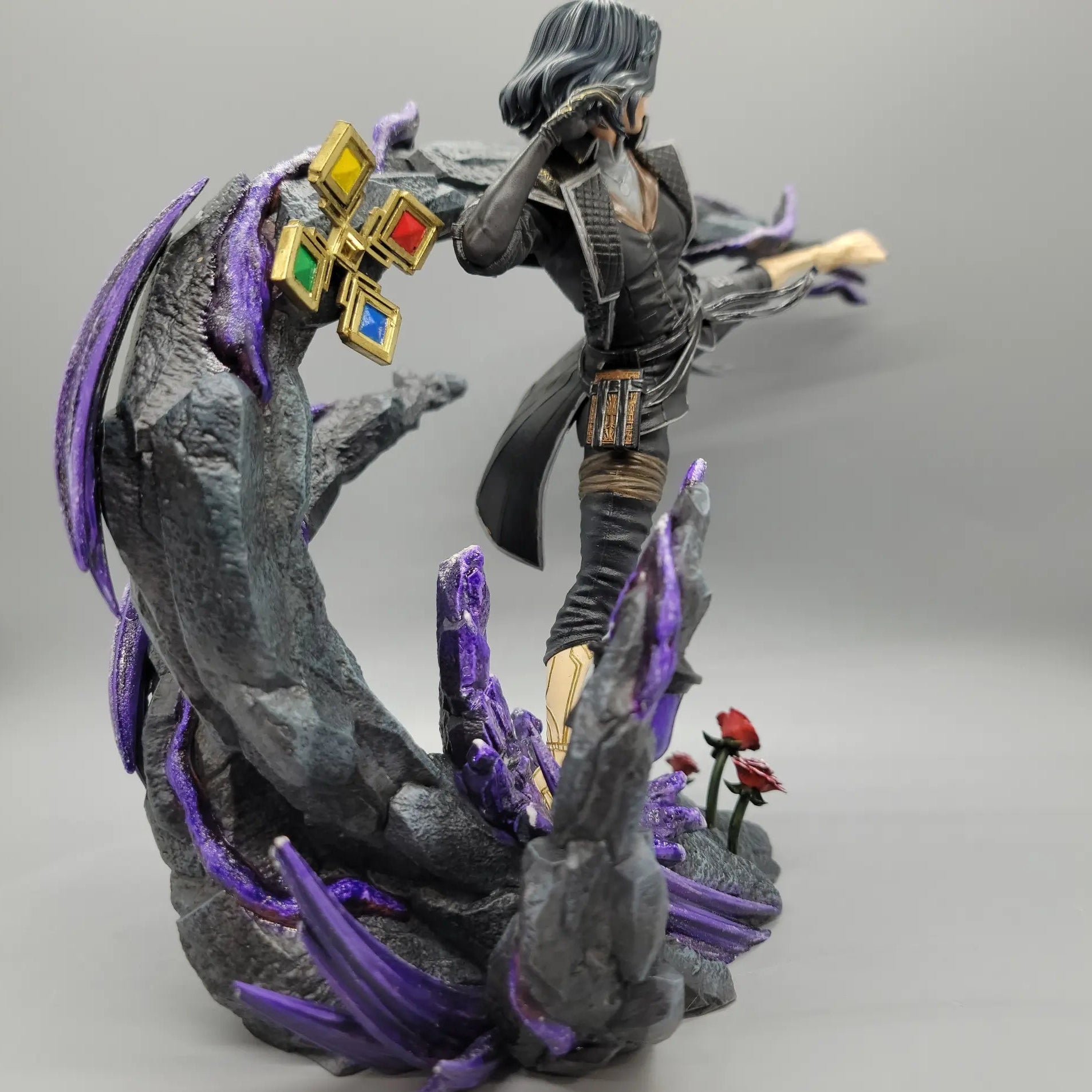 Rear side view of painted Lune resin statue with detailed base and purple effects