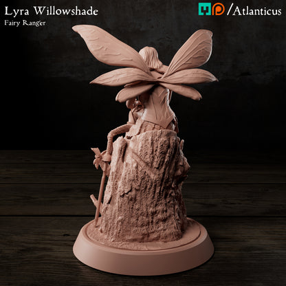 Rear side view of Lyra Willowshade showing her fairy wings, armor back, and the sword leaning against the base.