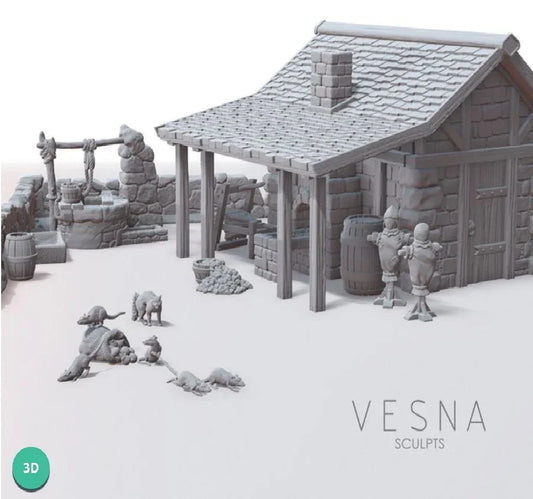 Perspective view of assembled medieval homestead scatter resin terrain set showing a stone cottage, outdoor well, training dummies, barrels, and rats.