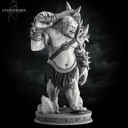 Three-quarter angle showing the muscular frame and spiked armor of the Mountain Troll miniature by Stormborn Collectibles.