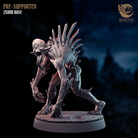 Crawling aberration miniature from Nausea set by Goetia, 25mm resin TTRPG horror creature with spikes and open maw.