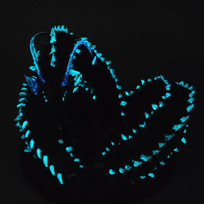 Dark glow photo of Old Mawgrin Ancient Leviathan miniature with glowing blue sea serpent details. Commissioned Paintwork by D&K Custom Prints