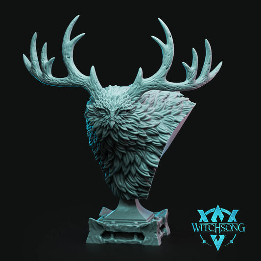 Owl Bear Elder display bust with branching antlers, owl-like face, layered feathers, and pedestal base.