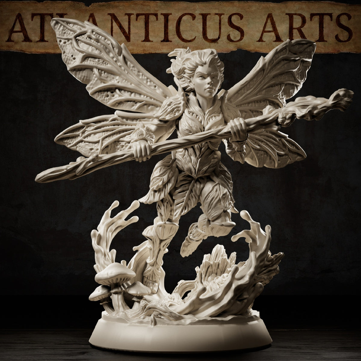 Pixie resin miniature flying above a woodland base with four patterned wings, twisted wooden staff, leaf clothing, mushrooms, and fallen tree details.