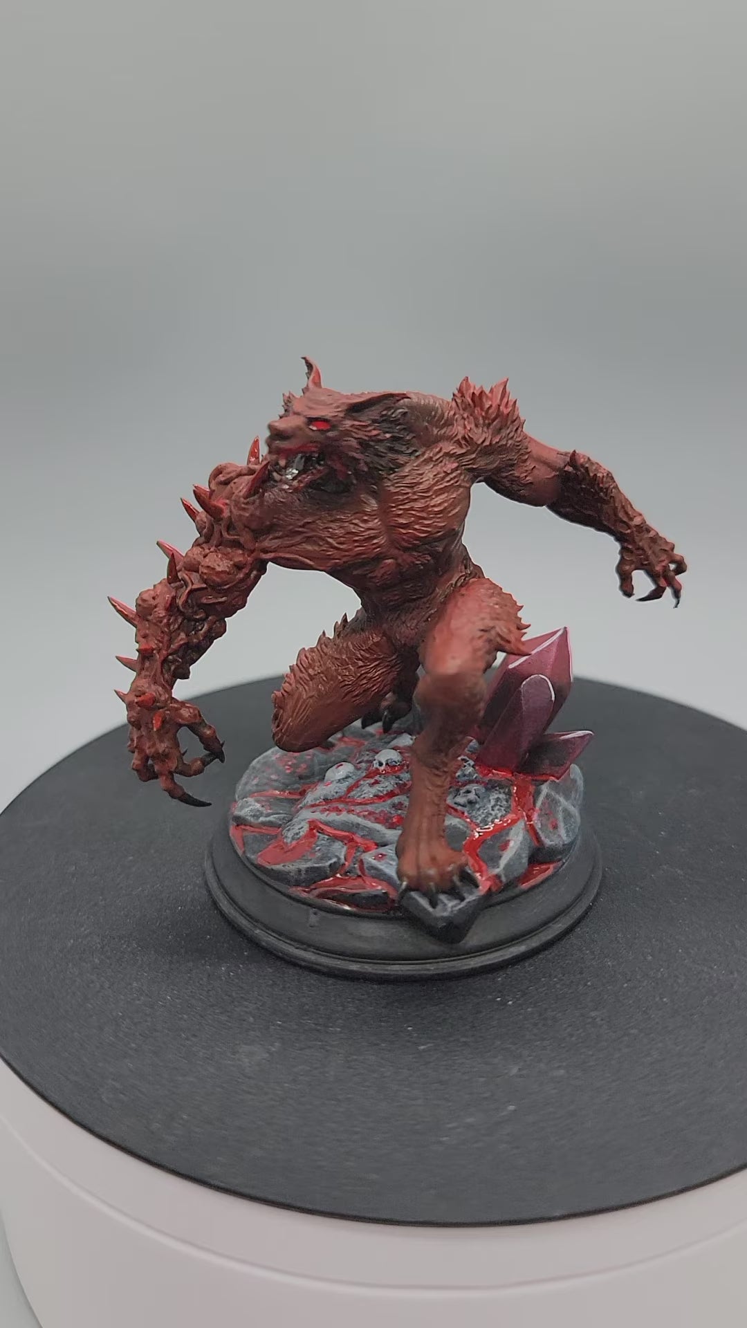 Bloodclaw Abominable Werewolf large sized resin miniature with spiked arm and feral snarl on a rocky base, perfect for TTRPG boss encounters.