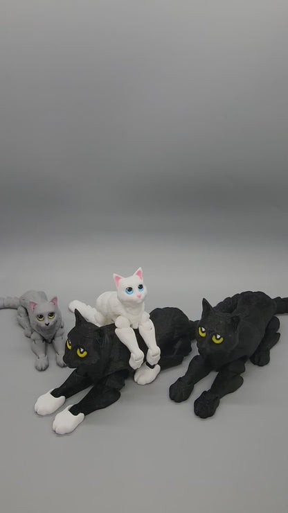 Showcase of 4 articulated cat minifigures, 2 are black & large with yellow eyes and the others are grey/white with yellow/blue eyes.