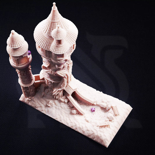 Top-down angle render of Rapunzel's Cursed Tower dice tower showing the detailed dice landing courtyard and twin spires.