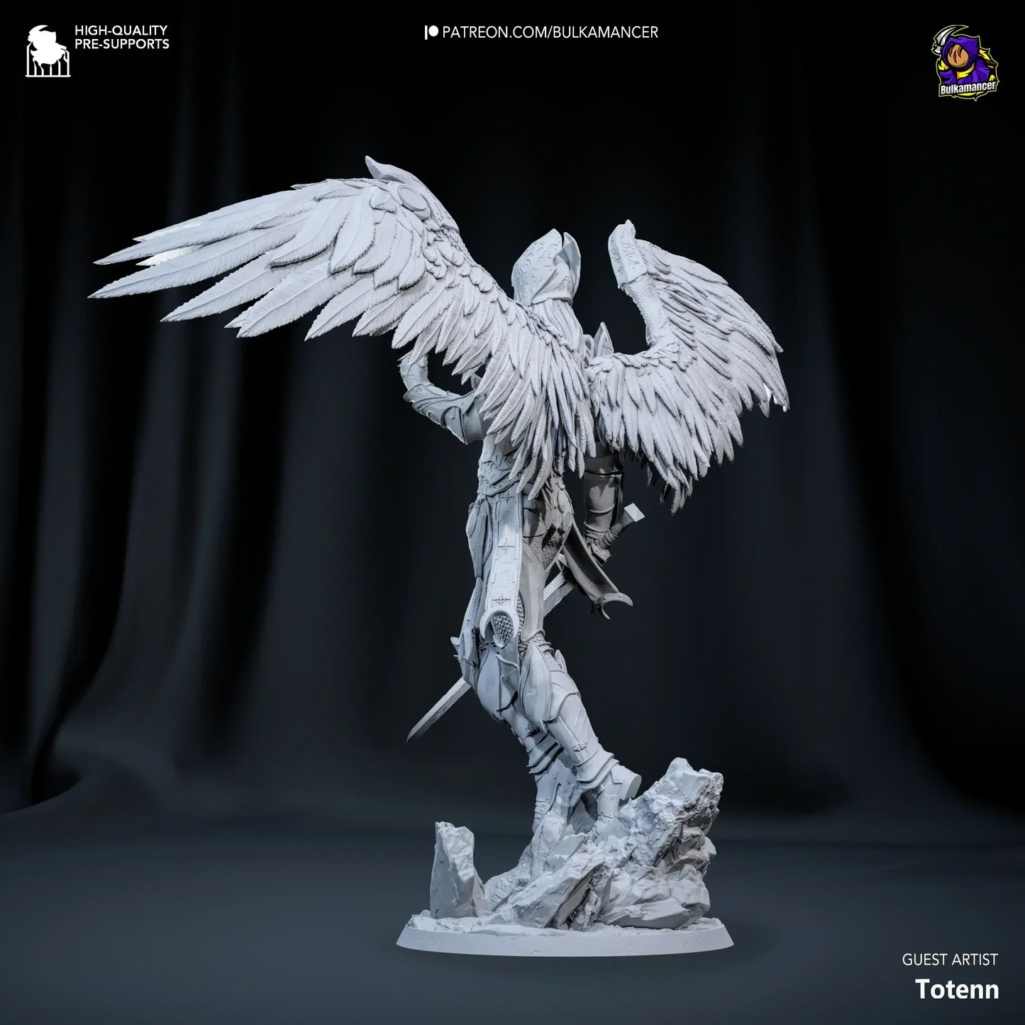 White resin figurine of a winged creature on a dark background